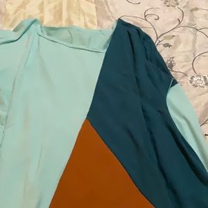 T-shirt type womens shirt, long sleeve multicolored I think it’s a 2X